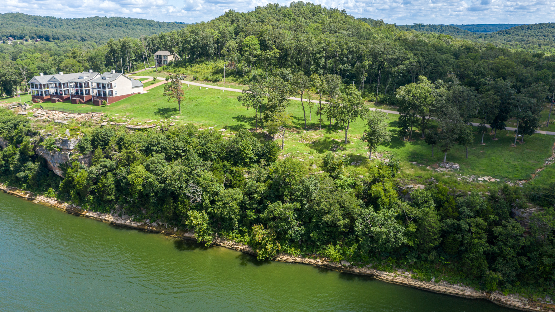 McLemore Auction Company 2 Cabin and 11 Waterfront Lots in Riverstone