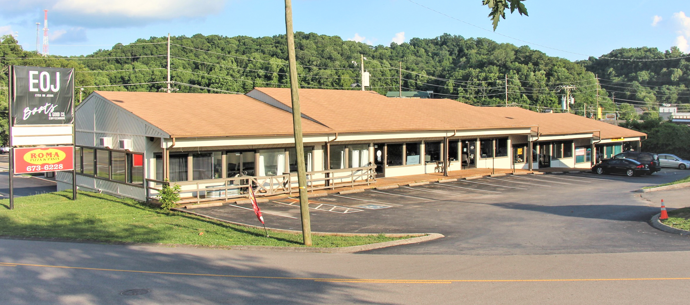 McLemore Auction Company Auction 6,800± sf Shopping Center on .47±