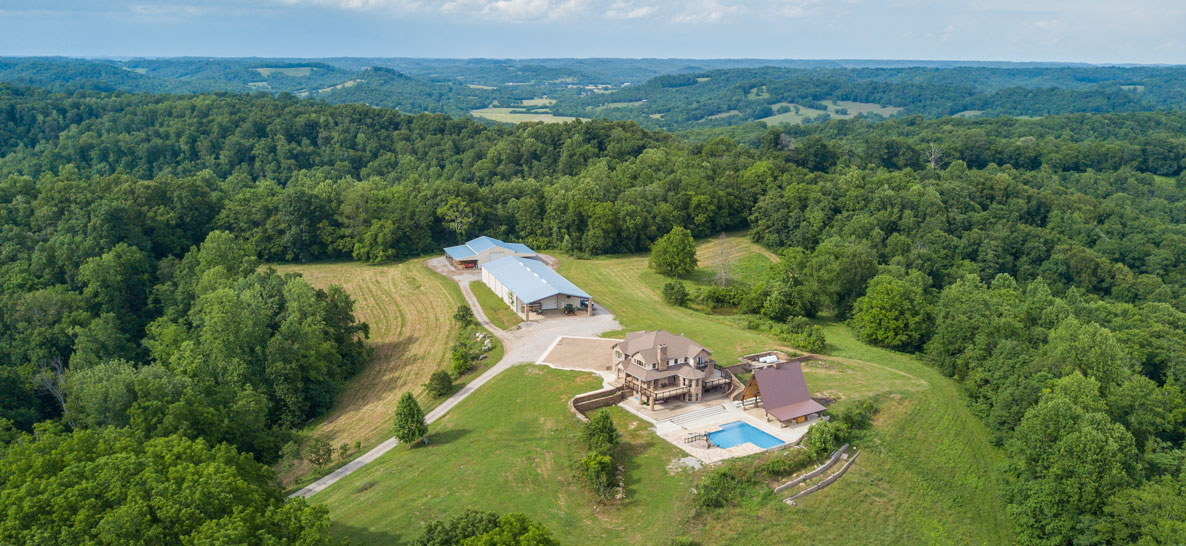 McLemore Auction Company Premier Home on 161± Acres Selling in 8